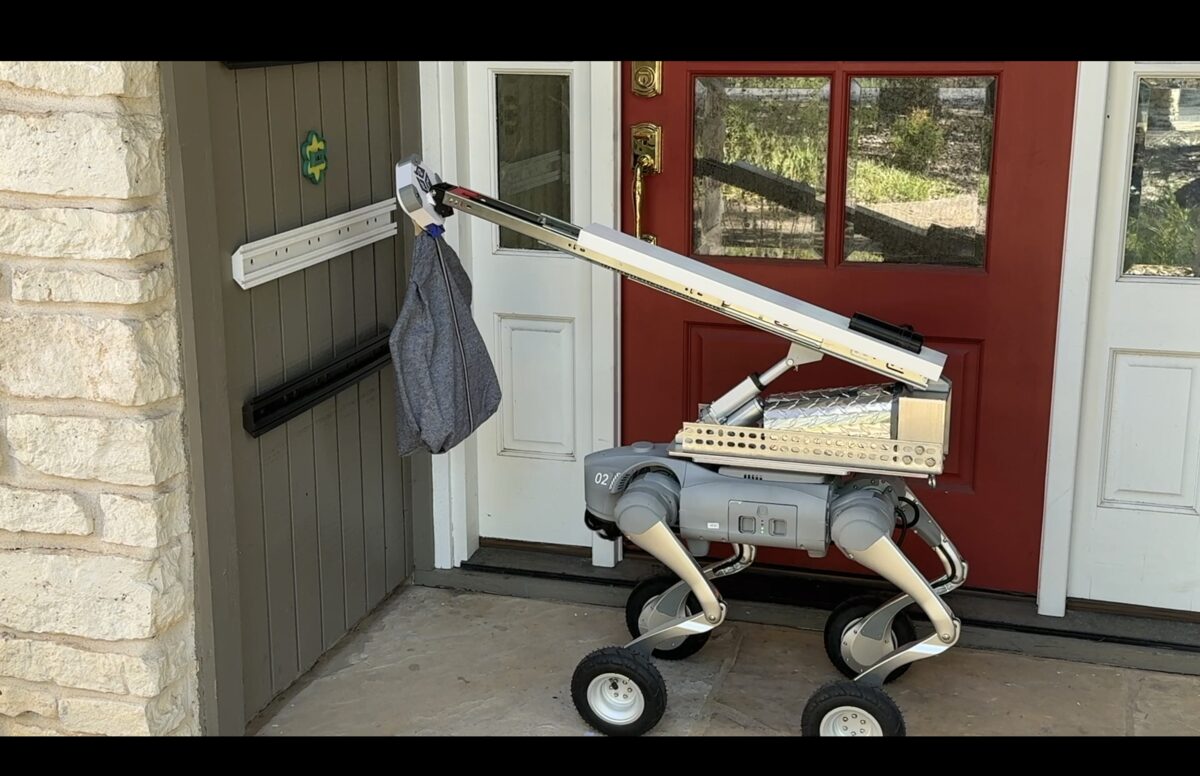 A courier handling Motogo parcels on a route