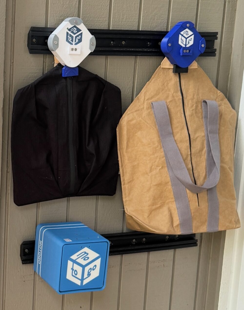 A customer using a Motogo parcel at the front door